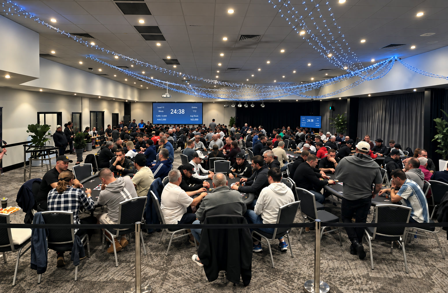 A full tournament room at a 124 Poker event, tables packed with players